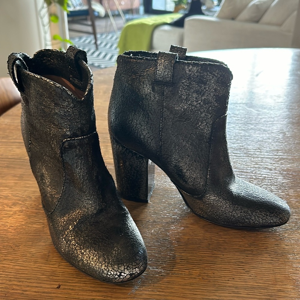 Laurence Dacade cracked metallic booties with a 4” block heel.